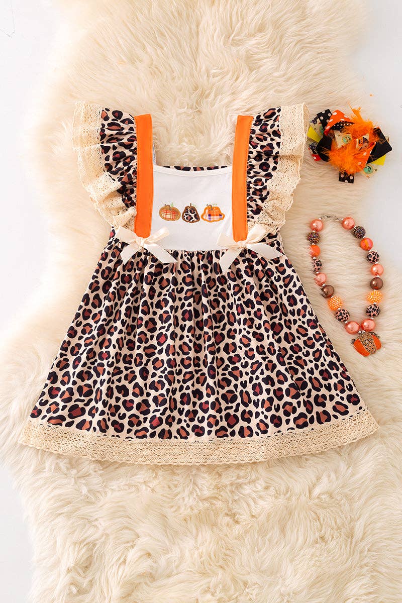 Animal printed girls dress with ivory embroidery